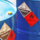 Close-up of a blue flammable liquid container